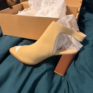 Womens open toe heeled bootie shoe.  Size 10.  Brand new.